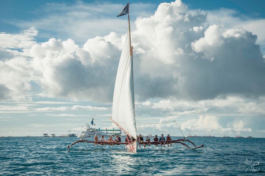 Island-hopping-around-Boracay-on-local-outrigger-boats.