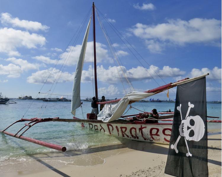  Funboard Center Boracay organises island hopping followed by a traditional Filipino BBQ on White Beach.