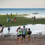 Kitesurfers from Funboard Center Boracay on the way back to White Beach.